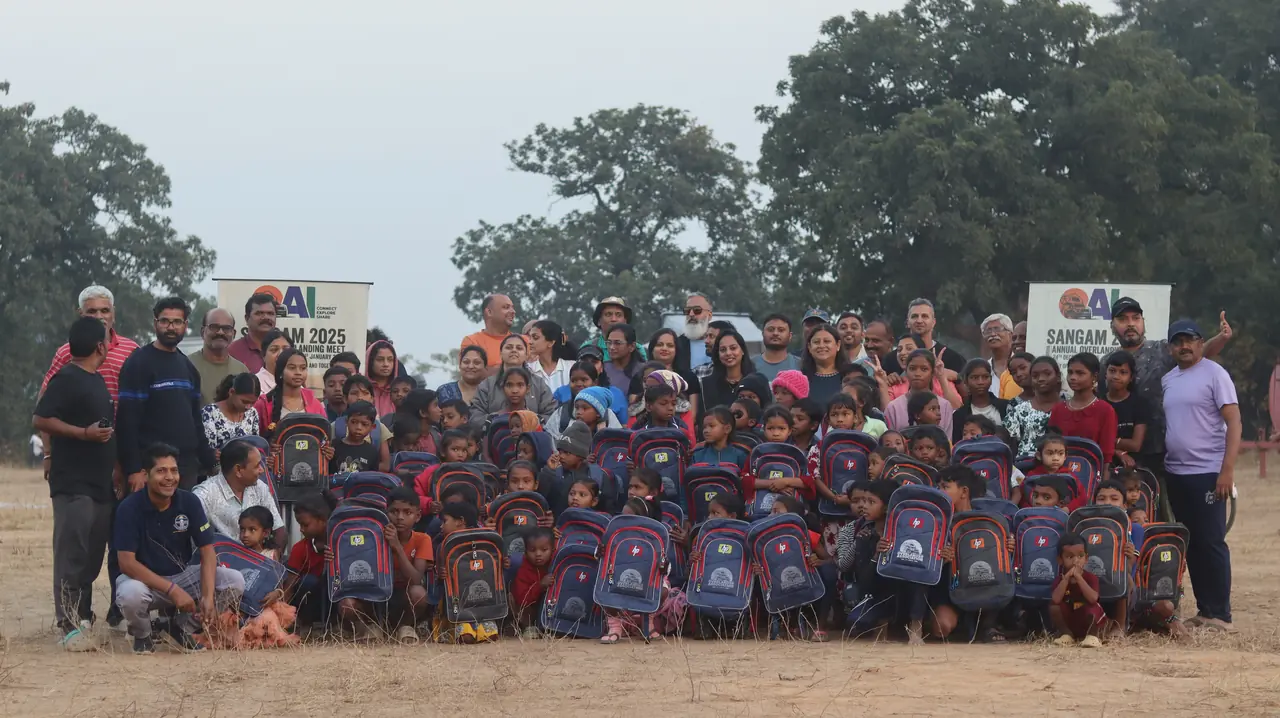 Local schoolchildren with their new backpacks at Hirakud