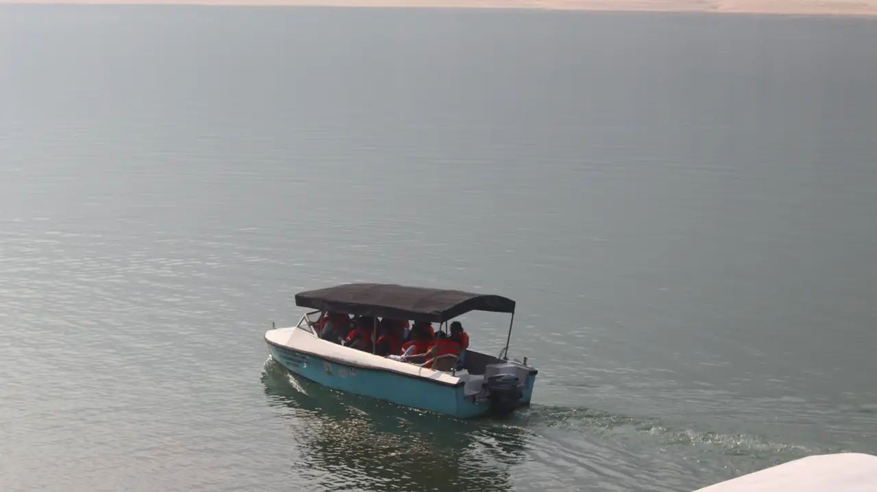 OAI members on a river boat ride near Satkosia