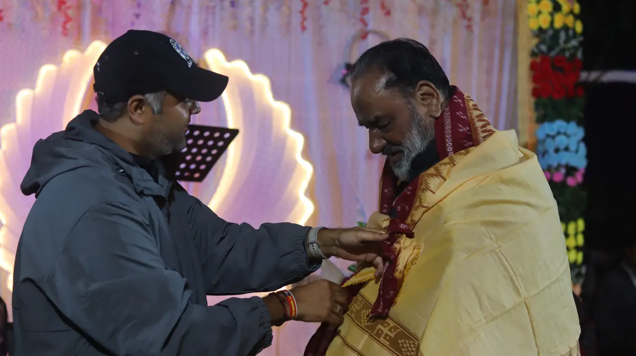 A felicitation ceremony on stage at Puri Beach