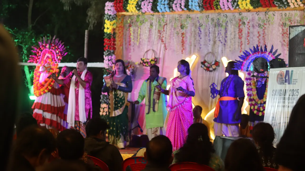 A colourful folk performance on stage at Puri Beach